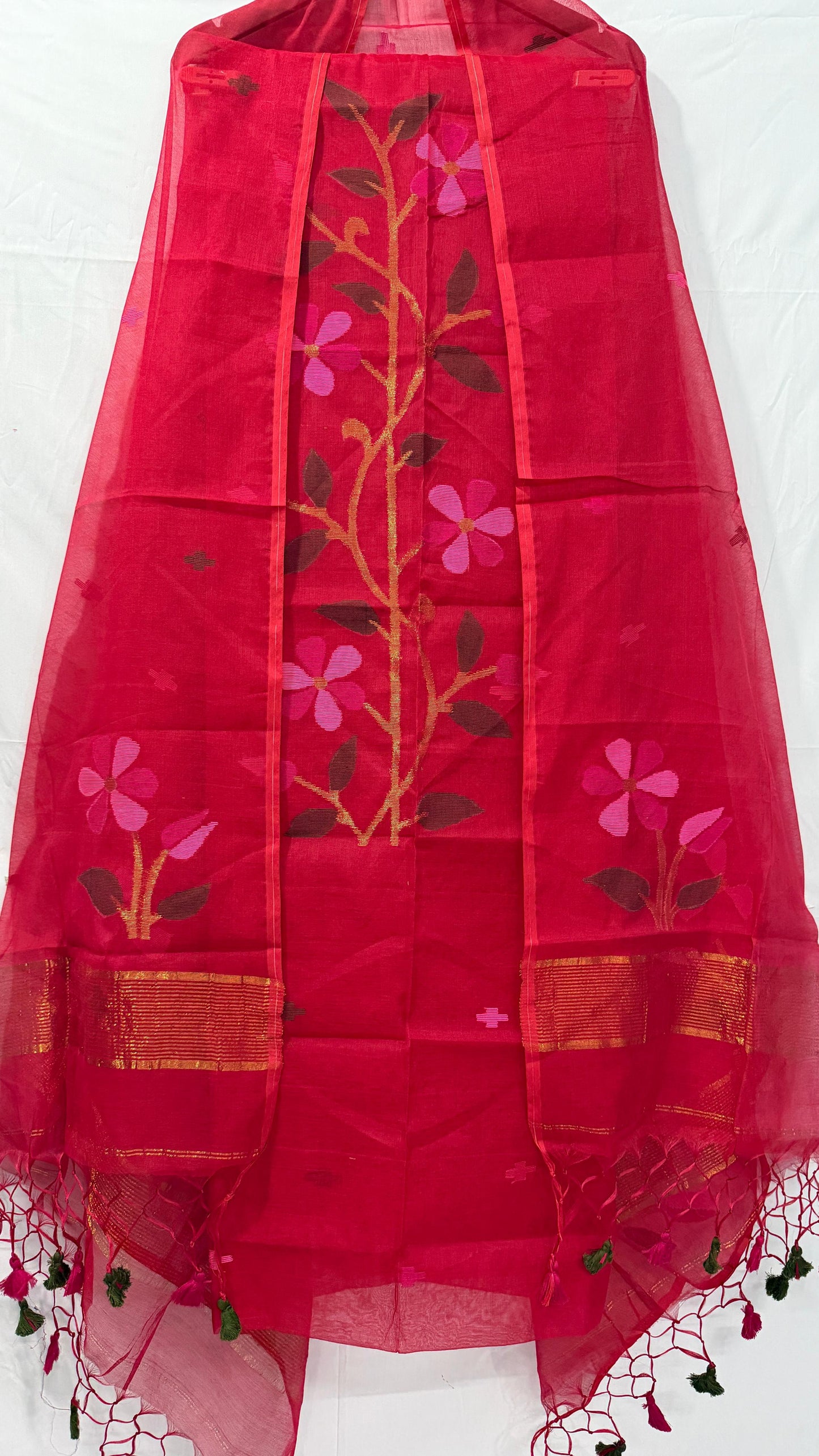 Handwoven Red Muslin Jamdani suit by Rihyaaz with a 2.5-meter top and 2.5-meter tassel-detail dupatta, showcasing elegant traditional Jamdani craftsmanship and premium ethnic fashion.