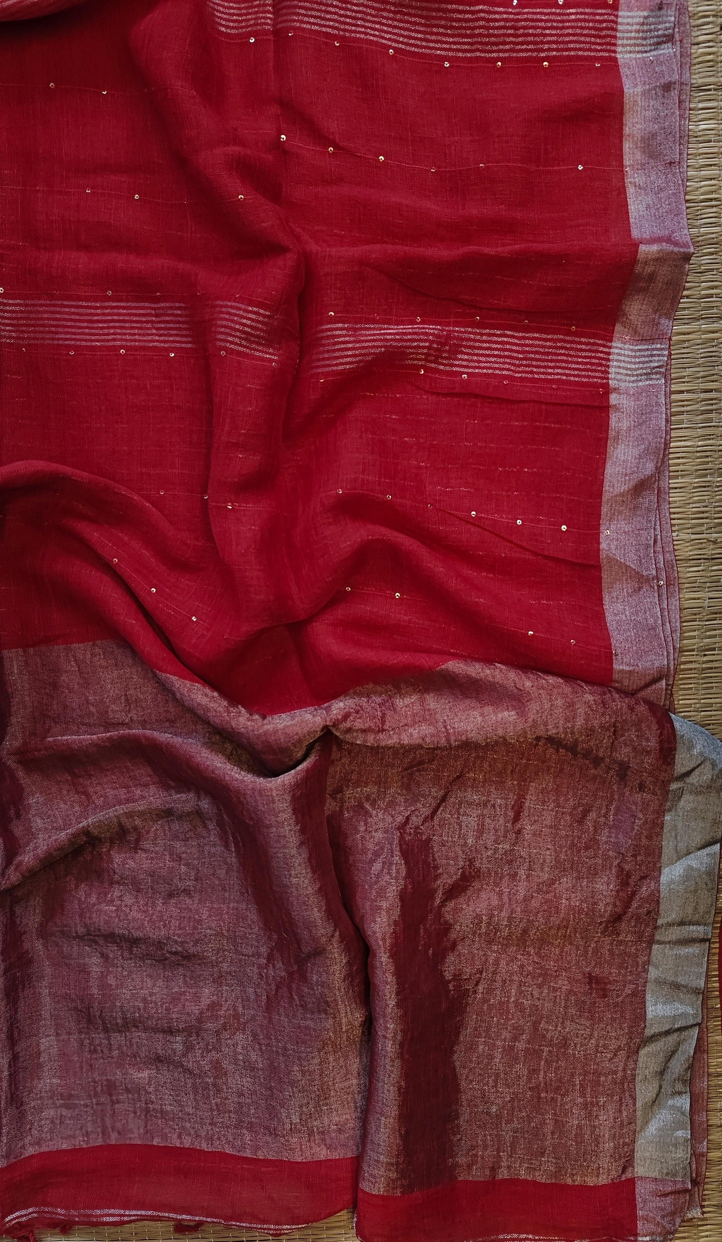 Pehal Premium Jayashree linen saree with tested zari pallu, sleek silver border, all-over sequin-line detailing and zari-striped blouse piece by Rihyaaz.