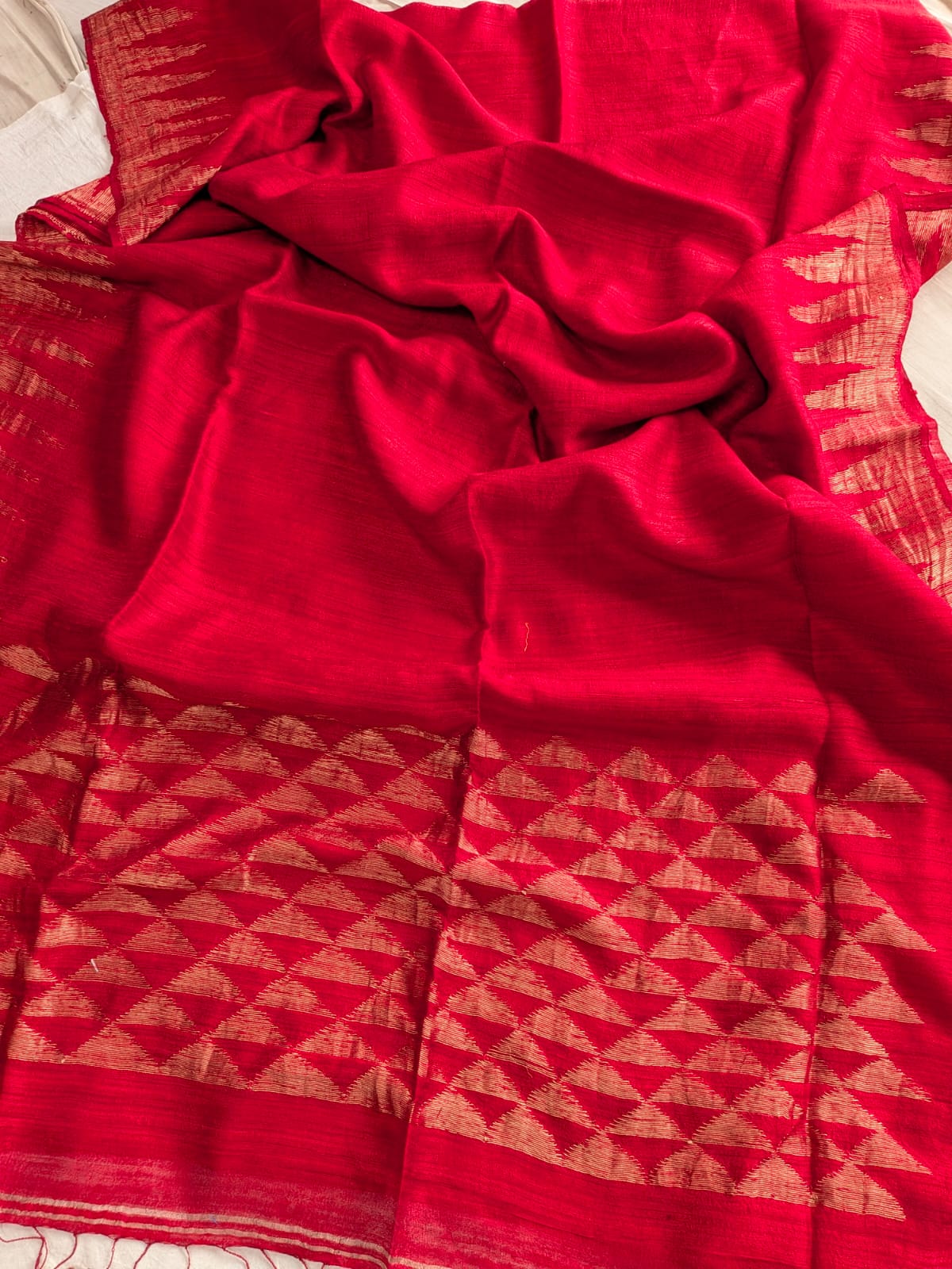 Durga Red premium-quality Pure Matka Jamdani saree with traditional woven designs and running Matka blouse piece by Rihyaaz Fashions.