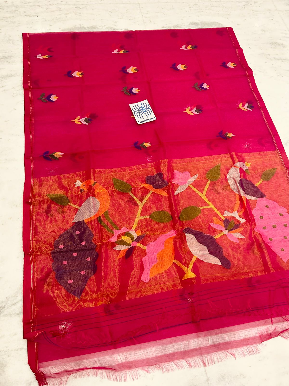 Shahi pure muslin handwoven saree with blouse piece by Rihyaaz, showcasing traditional Indian handloom craftsmanship and elegant woven texture.