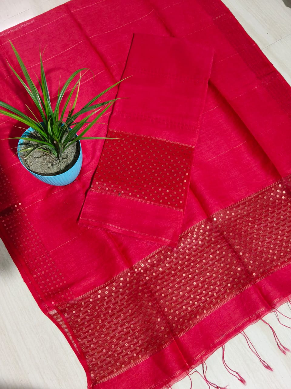 Ira new handwoven Silk Linen Jamdani suit set with 3 meter top and 2.5 meter dupatta featuring elegant net tassel detailing by Rihyaaz.