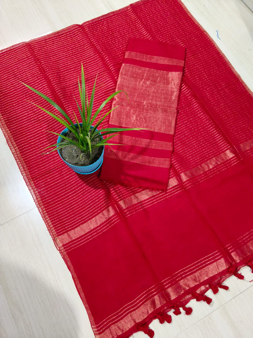 Soiree - premium silk linen zari weaved suit by Rihyaaz featuring intricate zari woven detailing and a luxurious zari dupatta for festive, wedding, and occasion wear.