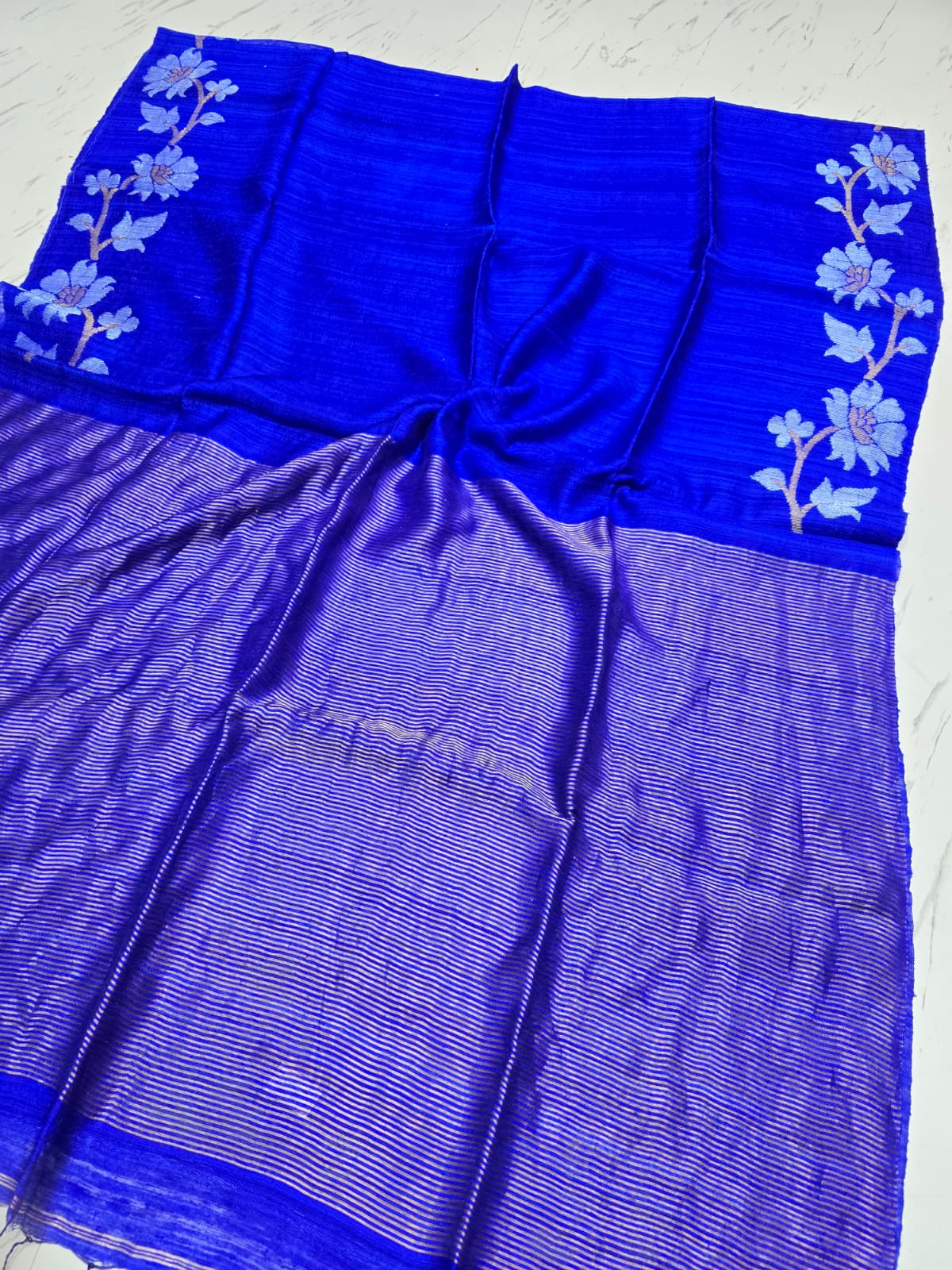 Jui Royal Blue Pure Motka Silk Saree with blouse piece from Rihyaaz. Premium-quality silk with Silk Mark authenticity, perfect for festive and traditional occasions.