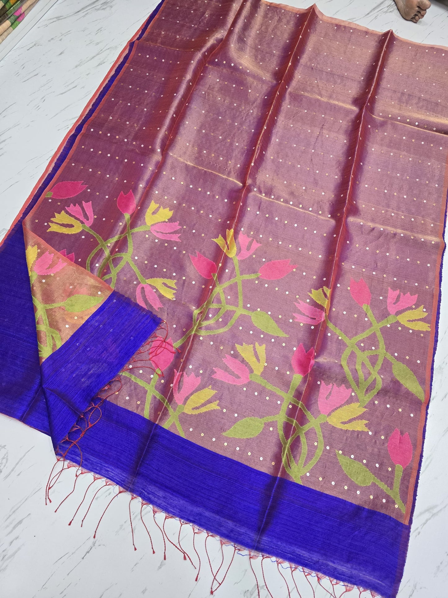 Raga sequin Matka saree with textured Matka body and elegant half tissue resham sequin Jamdani anchal. By Rihyaaz 