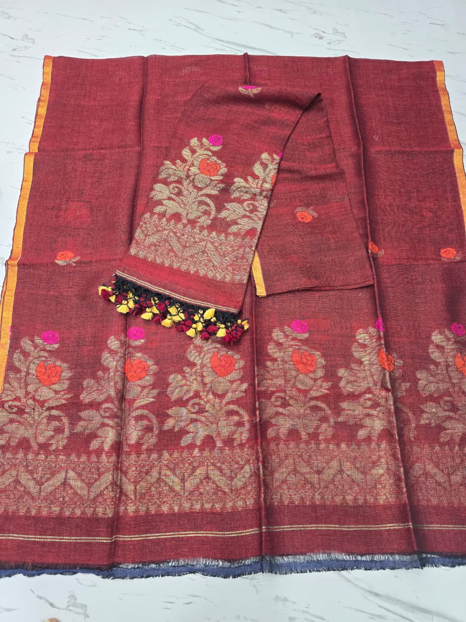 Linen zari weaved Jamdani suit with dupatta by Rihyaaz, showcasing elegant handwoven traditional craftsmanship and contemporary ethnic styling.