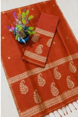 Kairi rust Pure Silk Linen Jamdani suit with handwoven detailing and net tassel dupatta by Rihyaaz