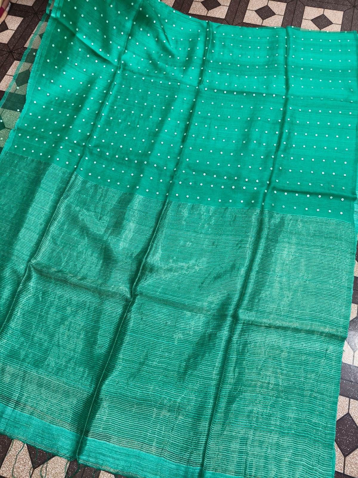 Shatranj Pure Matka Muslin Silk saree with zari border and all-over white sequin sea-shell woven palla, paired with running Matka blouse piece by Rihyaaz 