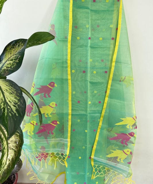 Chidiya muslin woven suit with zari and silk weaving, featuring polka dot motifs on the top by Rihyaaz Fashions.
