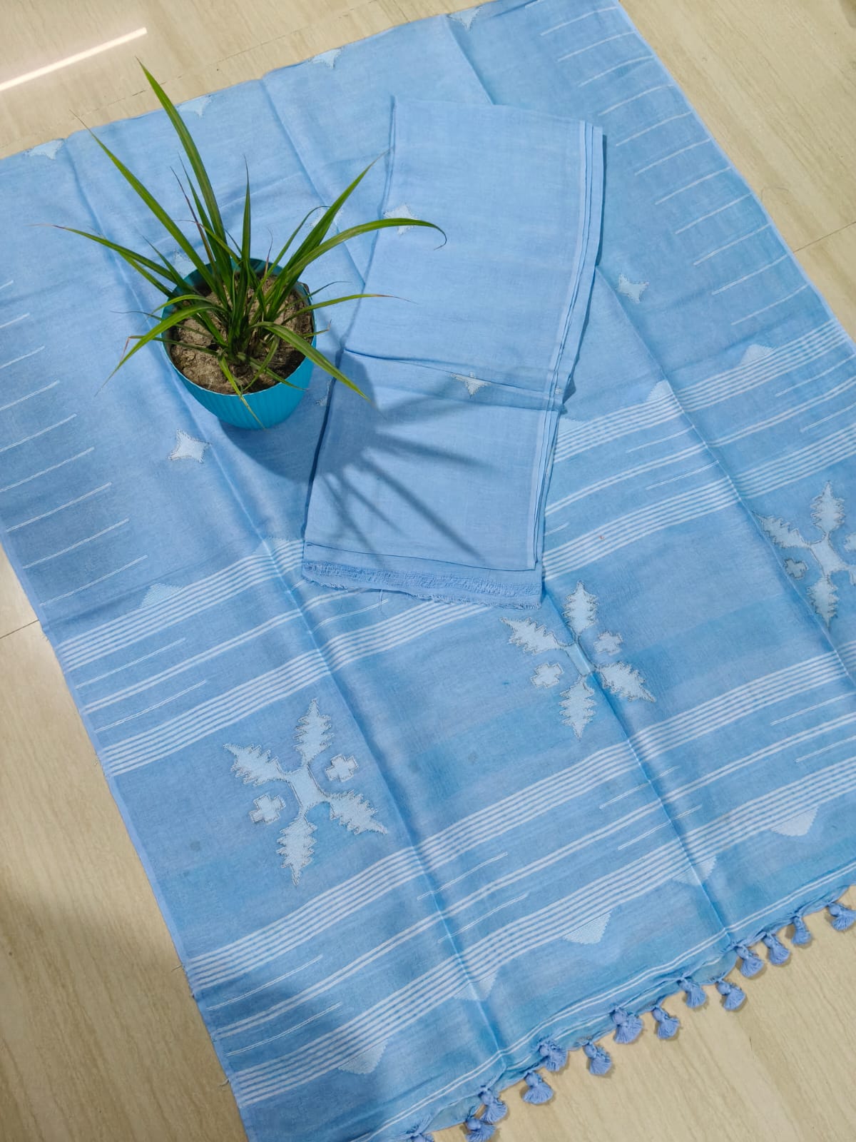 Sparsh linen Jamdani suit with 3-meter top and 2.5-meter tasselled dupatta by Rihyaaz