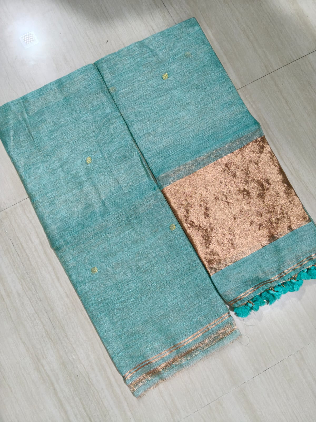 Premium silk tissue linen suit set with broad zari palla dupatta in elegant festive ethnic wear for women.