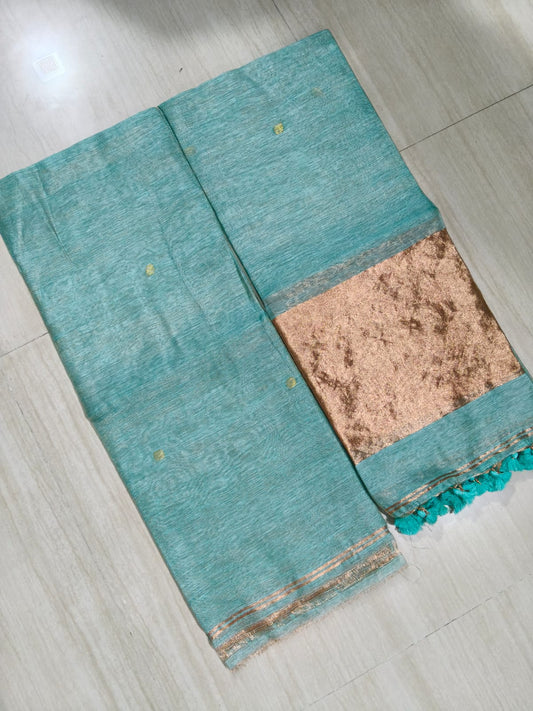 Premium silk tissue linen suit set with broad zari palla dupatta in elegant festive ethnic wear for women.