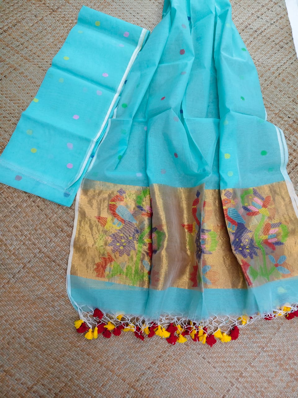 Morni sky premium muslin tissue suit with intricate needle work Jamdani palla Peacock Motif dupatta by Rihyaaz.