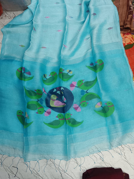 Parrot - Silk Linen Needle Jamdani Weaved Saree from Rihyaaz, crafted with delicate Jamdani-inspired needle weaving and parrot motiffs. Its lightweight silk-linen texture and refined detailing make it an elegant choice for festive occasions, celebrations, and sophisticated everyday dressing.