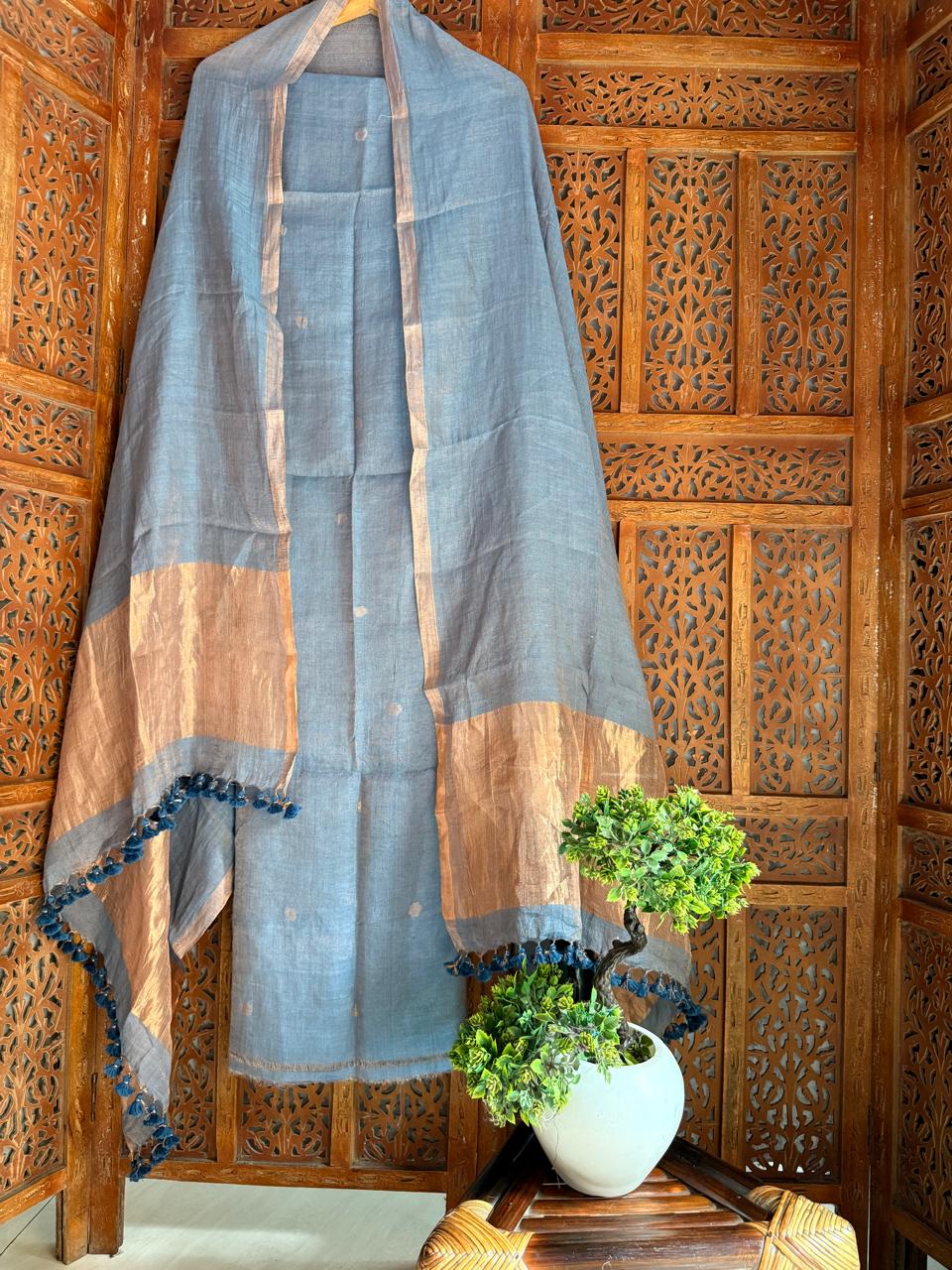 Premium broad zari palla dupatta with polka dot linen suit set in handcrafted ethnic design for festive and elegant wear.