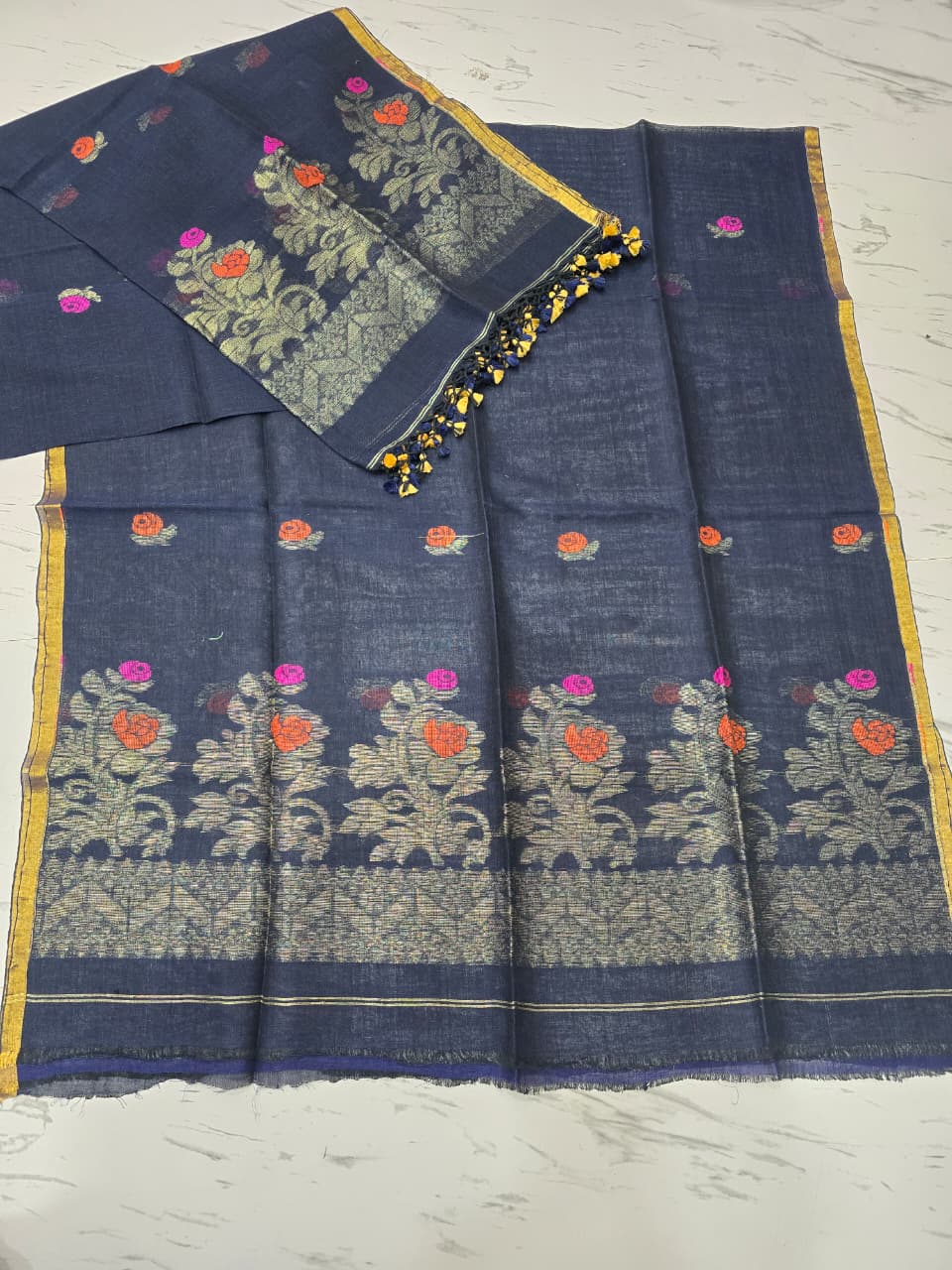 Linen zari weaved Jamdani suit with dupatta by Rihyaaz, showcasing elegant handwoven traditional craftsmanship and contemporary ethnic styling.