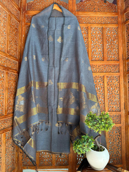 Jarau slate blue organic 100 count linen by linen 2-piece suit with all-over needle Jamdani weaving on kurta and antique zari Meenakari work on both sides of the dupatta by Rihyaaz.