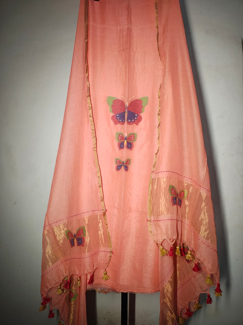 Titli trio zari handwoven Mul Cotton suit with delicate butterfly motifs and elegant zari detailing for a refined royal look by Rihyaaz 