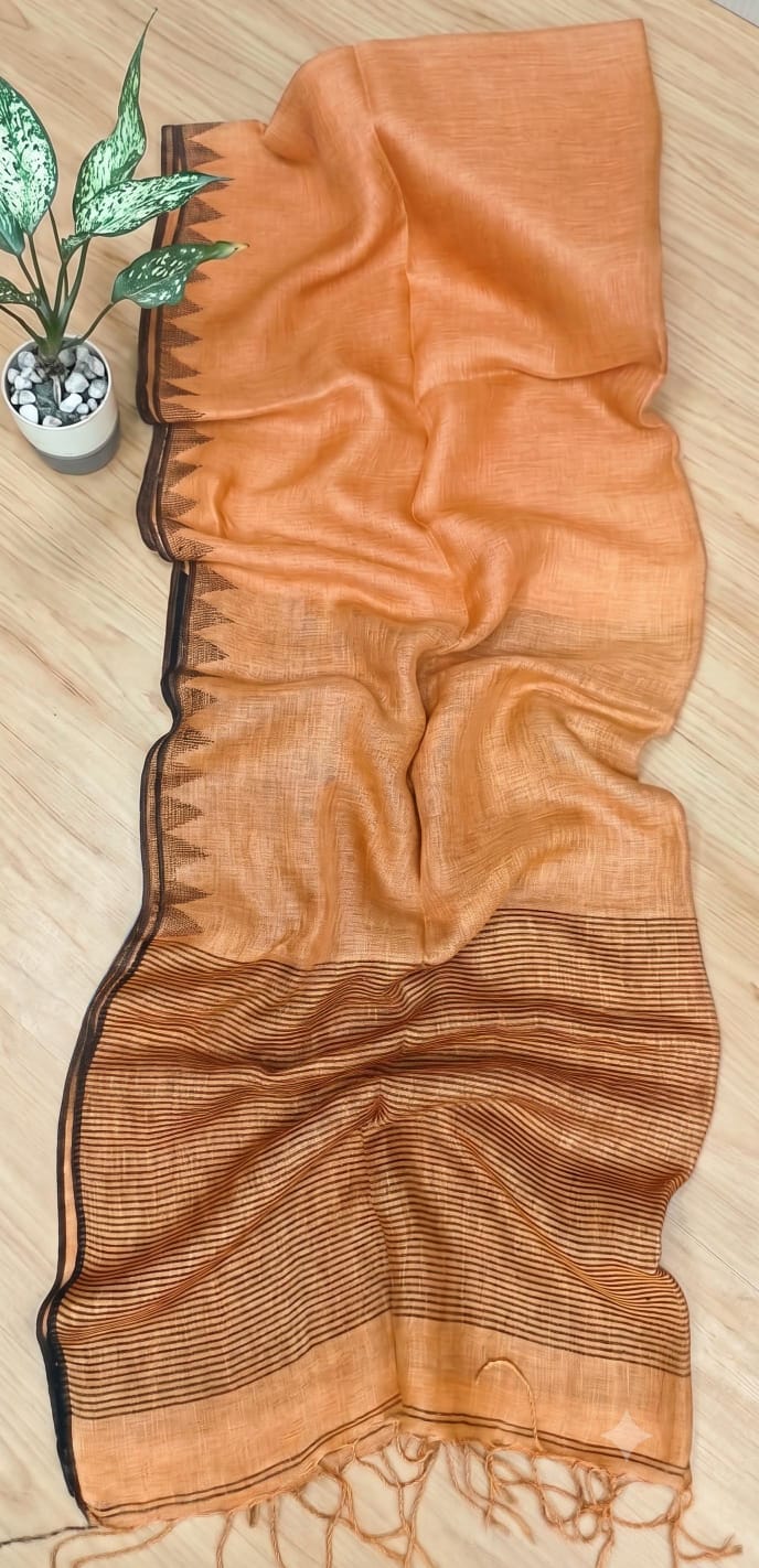 Soft Peach Pure silk Jayashree linen saree with traditional temple border, striped palla and running blouse piece by Rihyaaz Fashions.