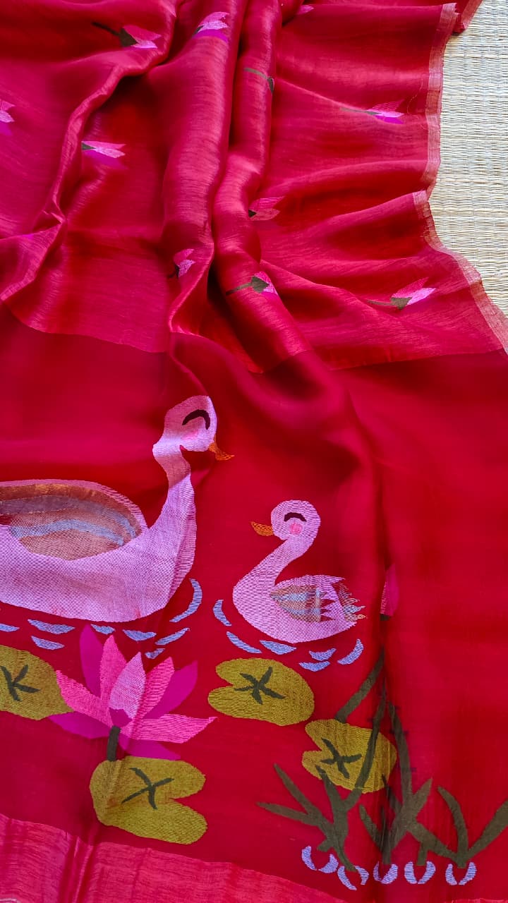 Morali Strawberry pure silk Jayshree linen saree with sleek zari border, handwoven Jamdani resham palla and delicate lotus motifs all over the body, with running blouse piece by Rihyaaz Fashions.