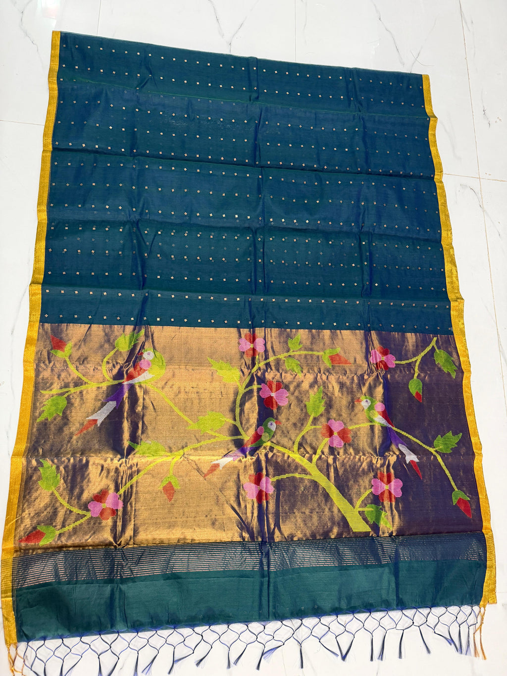 Tehni Teal Blue sequin weaved Muslin Paithani saree by Rihyaaz, elegant traditional festive saree with intricate Paithani weaving and allover weaved sequin detailing.