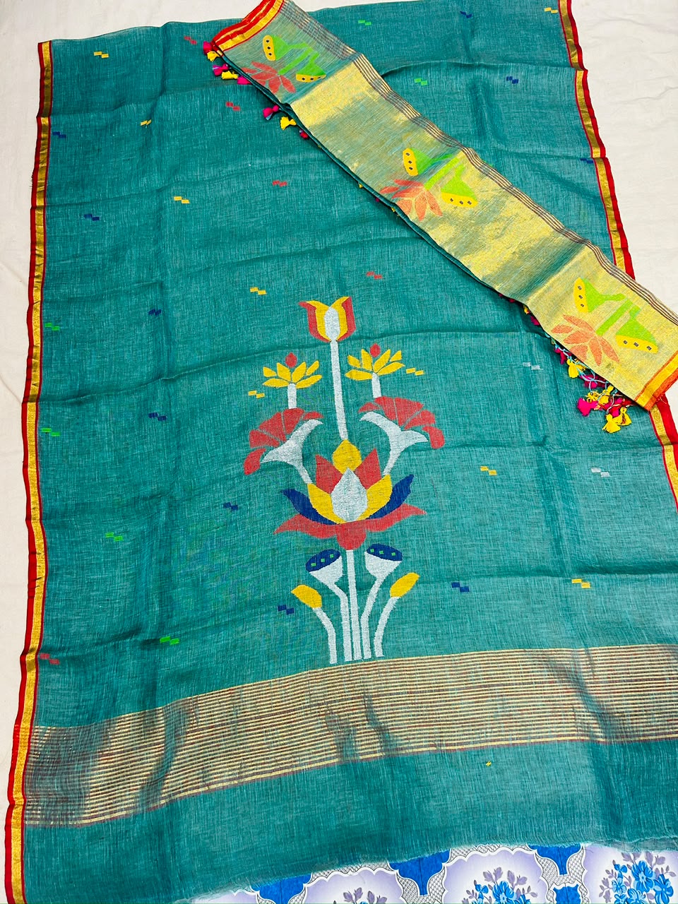 Linen Jamdani suit set by Rihyaaz featuring 2.5 metre top fabric and dupatta, showcasing elegant traditional Jamdani weaving and handcrafted ethnic design.