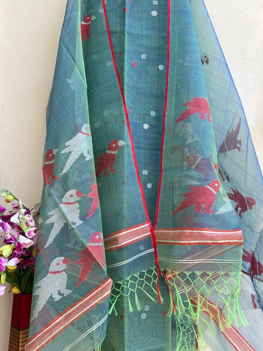 Chidiya muslin woven suit with zari and silk weaving, featuring polka dot motifs on the top by Rihyaaz Fashions.