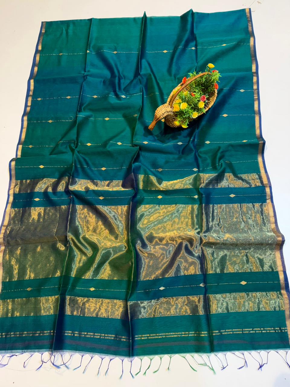 Noor, teal blue premium silk dual-tone Maheshwari saree by Rihyaaz Fashions, blending traditional Indian handloom elegance with timeless festive styling.
