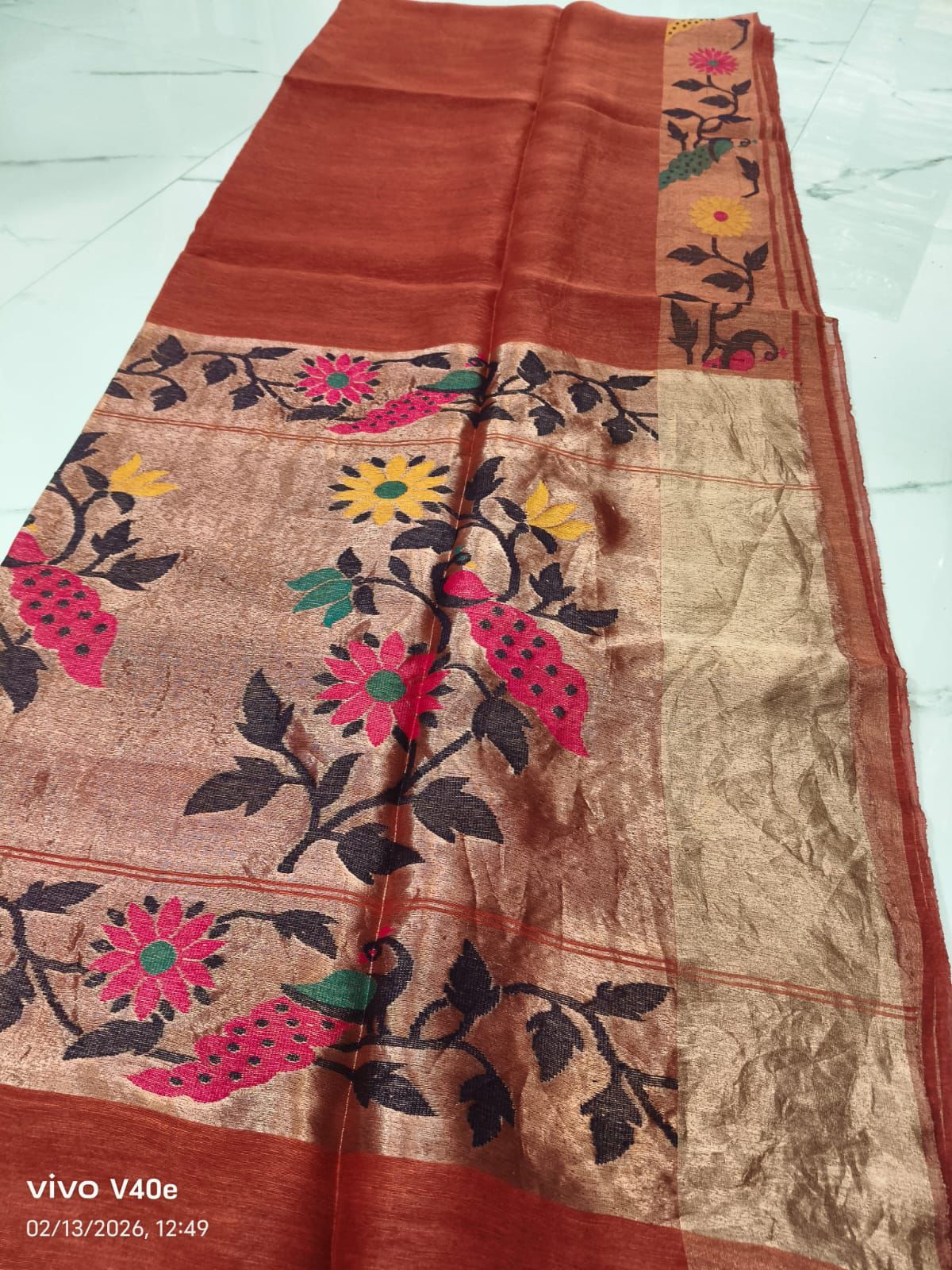 Tarang pure linen tissue Jamdani saree featuring a beautifully detailed needlework Jamdani border with floral and bird motifs, by Rihyaaz.