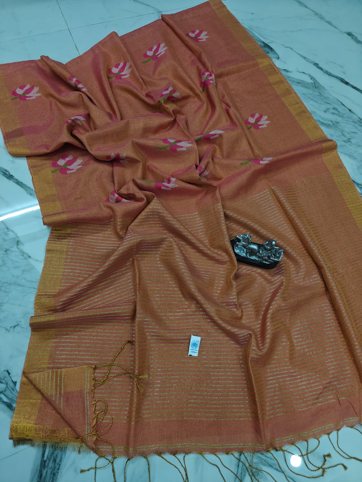 Lolita tissue linen allover weaved floral motiffs needle Jamdani saree with blouse piece, and striped zari weave in Pallu, handcrafted Bengali saree by Rihyaaz