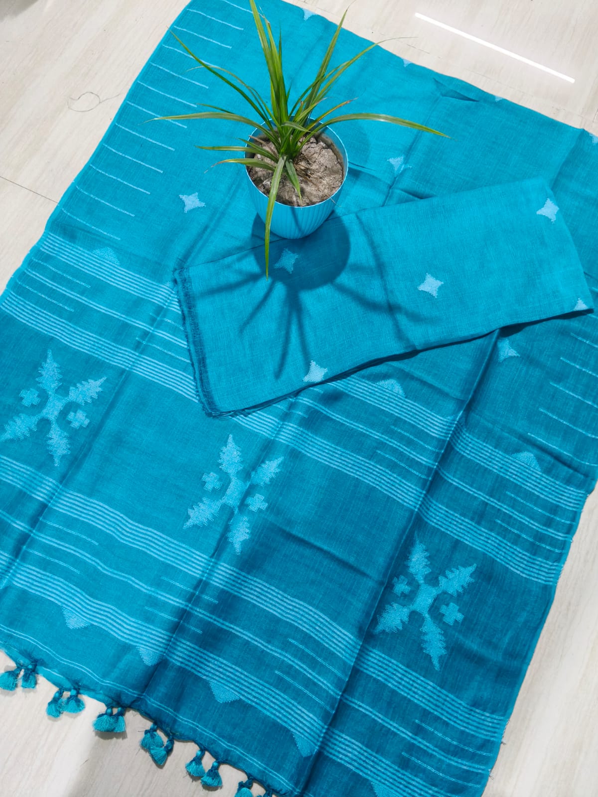 Sparsh linen Jamdani suit with 3-meter top and 2.5-meter tasselled dupatta by Rihyaaz
