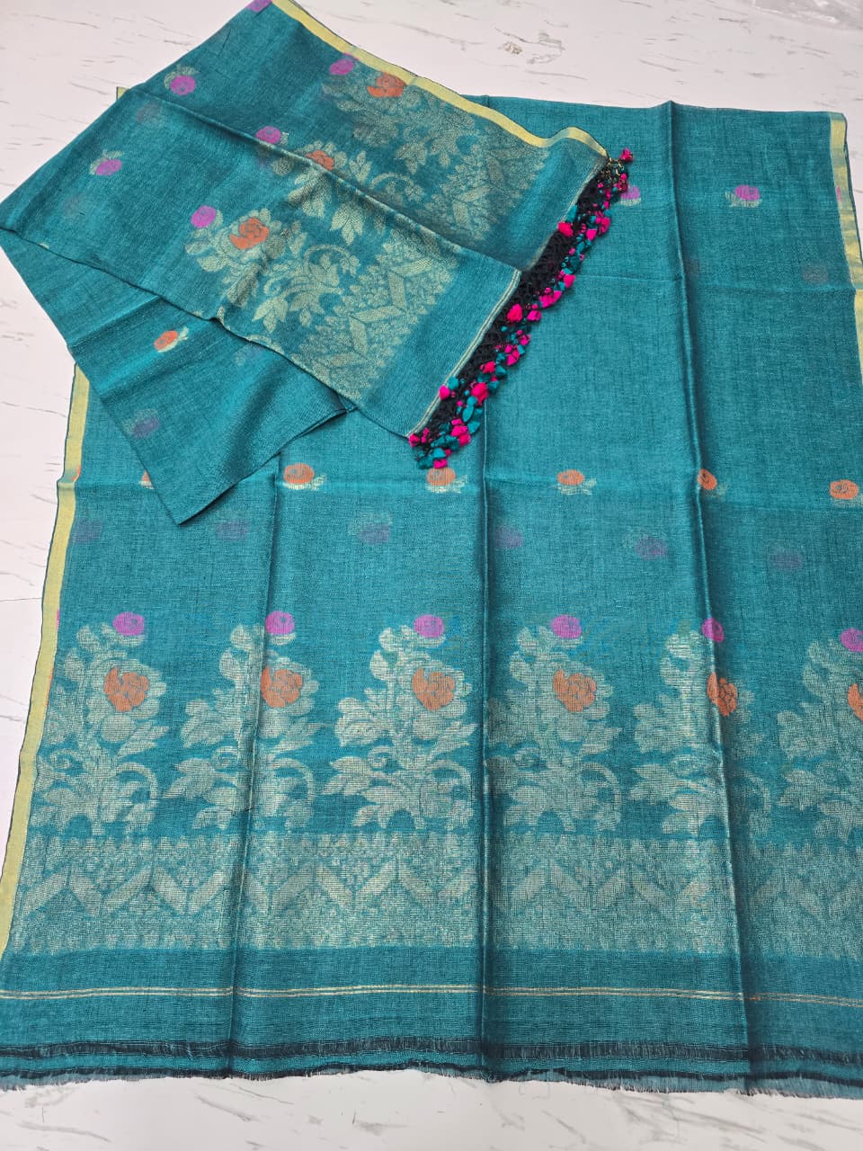 Linen zari weaved Jamdani suit with dupatta by Rihyaaz, showcasing elegant handwoven traditional craftsmanship and contemporary ethnic styling.