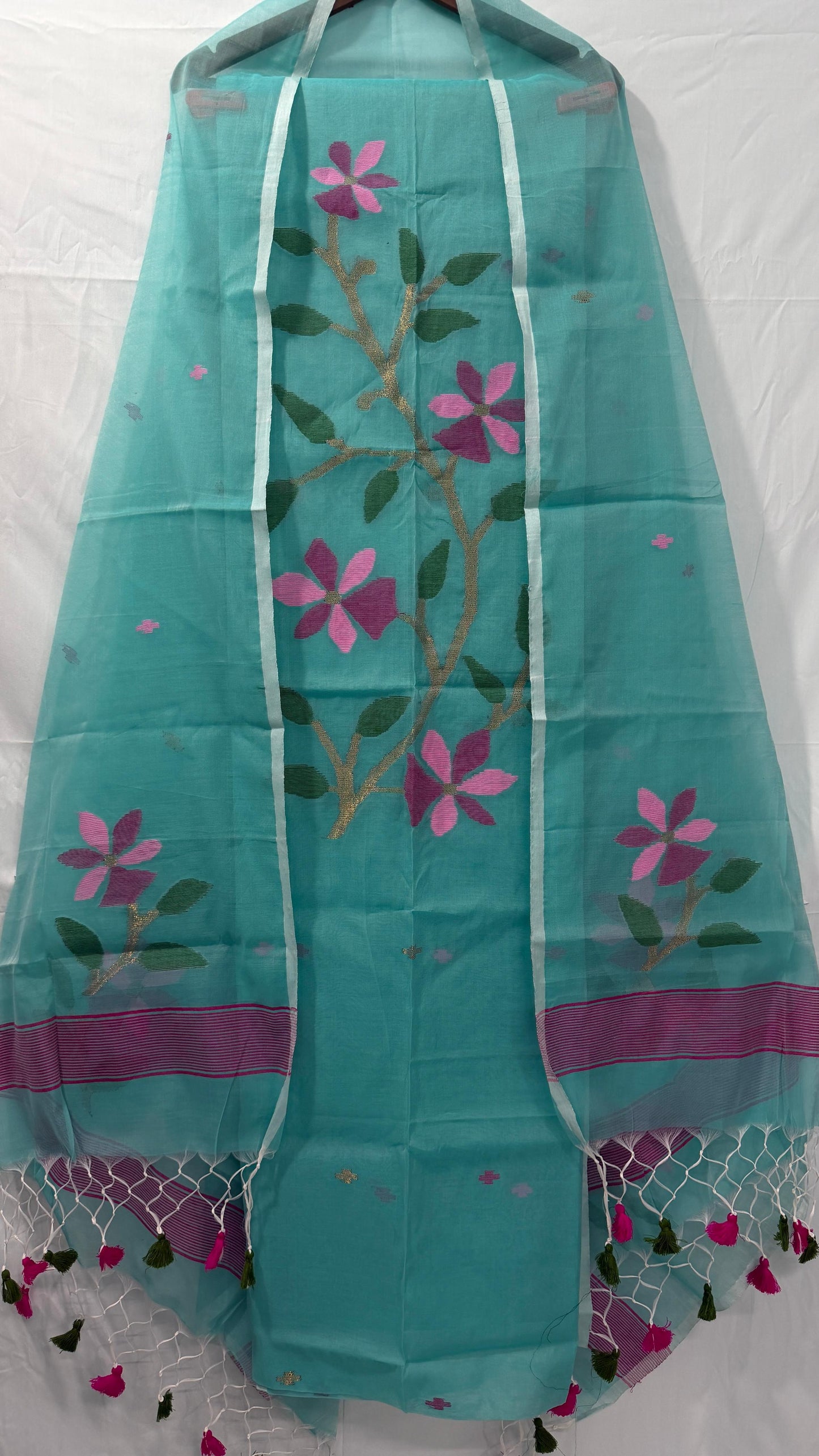Rihyaaz Muslin Jamdani suit with handwoven detailing, 2.5 meter top and 2.5 meter tassel-finished dupatta.