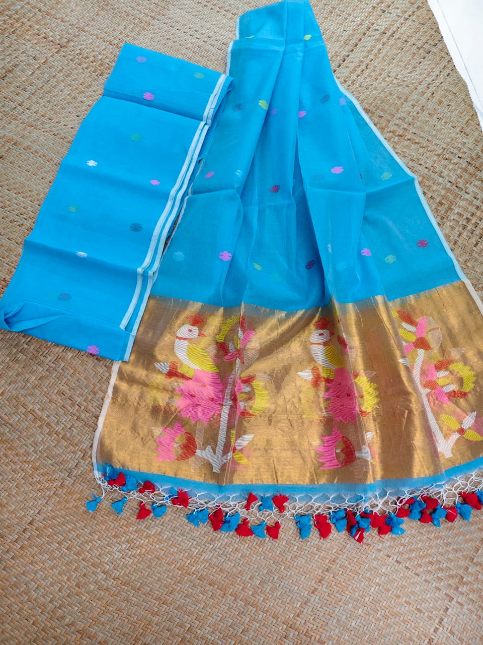 Morni turquoise premium muslin tissue suit with intricate needle work Jamdani palla Peacock Motif dupatta by Rihyaaz.