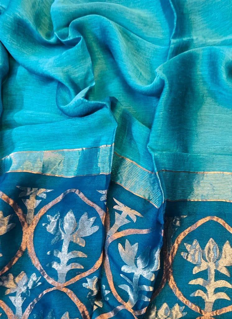 Padma pure silk tissue linen saree with lotus fusion zari woven palla, all-over lotus border and running blouse piece by Rihyaaz.