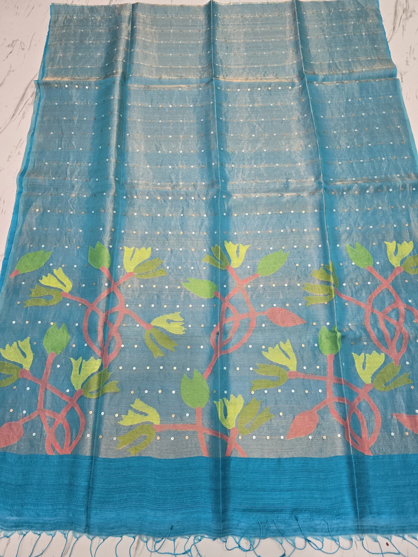 Raga sequin Matka saree with textured Matka body and elegant half tissue resham sequin Jamdani anchal. By Rihyaaz 