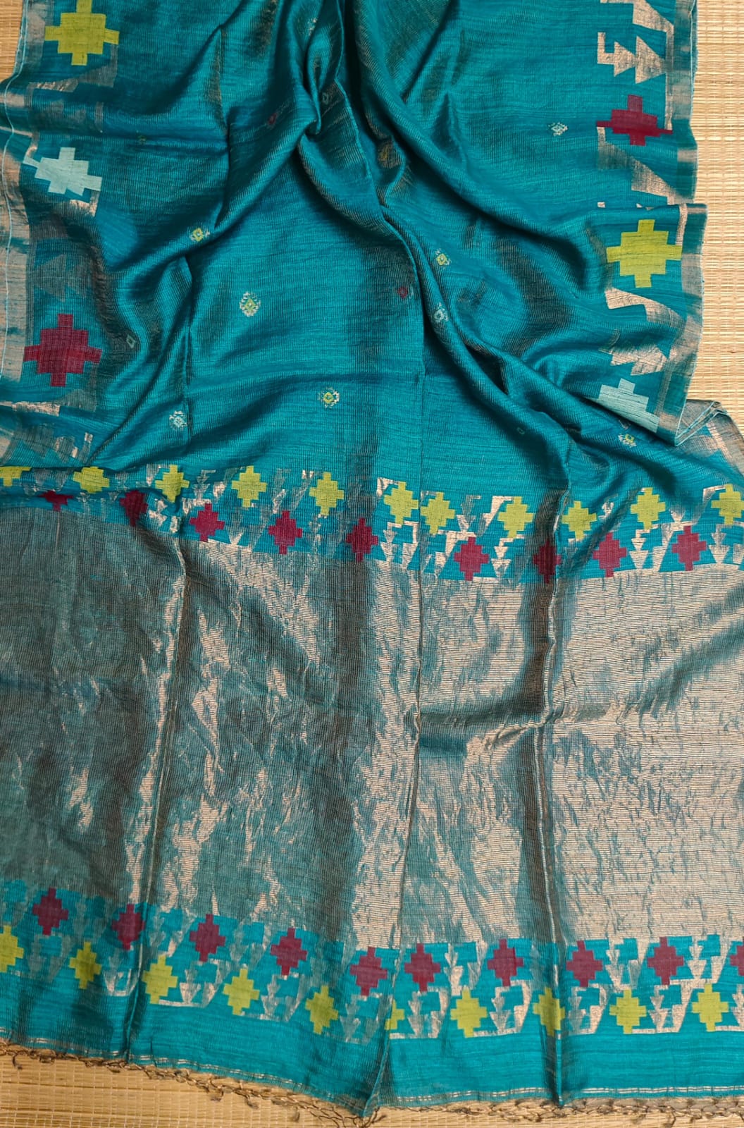 Qafiya - Handwoven Tussar Needle Jamdani saree by Rihyaaz featuring intricate woven motifs, premium Tussar silk fabric, elegant drape, and authentic Bengal craftsmanship for festive and wedding wear.