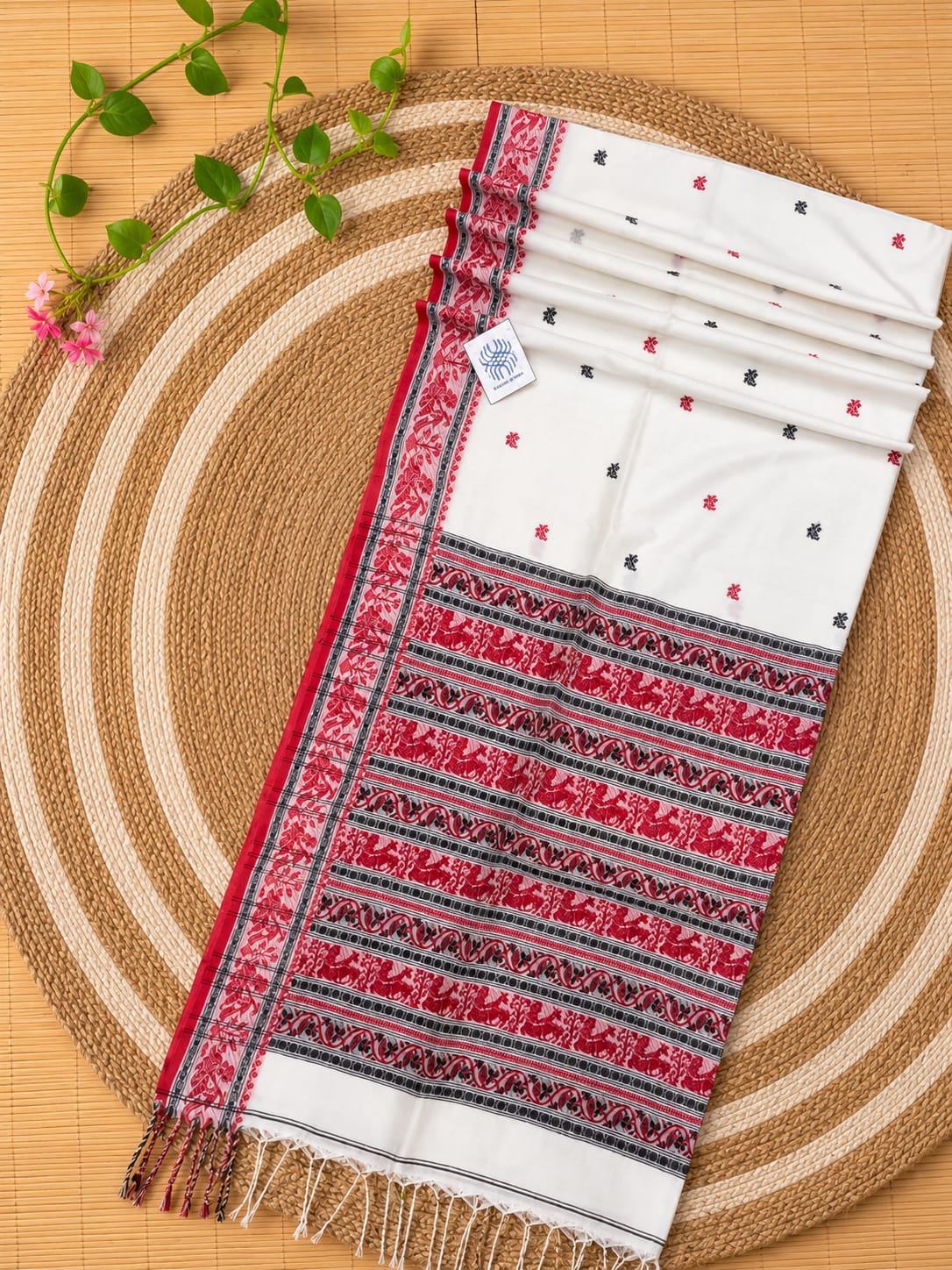 Authentic premium quality handloom Cotton Khadi Baluchuri saree by Rihyaaz, featuring unique traditional Baluchuri-inspired weaving, intricate heritage motifs, elegant handloom texture, breathable cotton khadi fabric and a matching running blouse piece, showcasing timeless Indian craftsmanship and refined ethnic elegance.