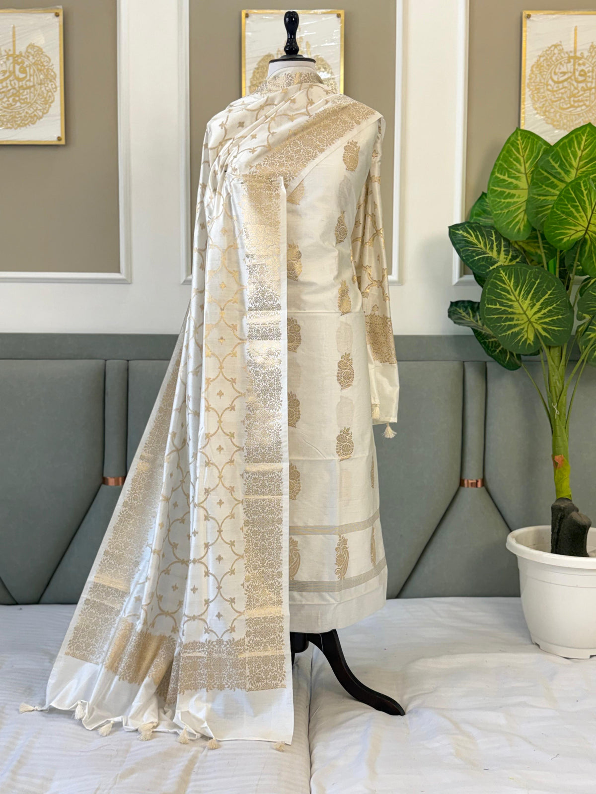 Exclusive White Banarasi Chiniya Silk Unstitched Salwar Kameez Design No. 8 by Rihyaaz, featuring a semi Chiniya silk top with intricate zari weaving, matching semi Chiniya silk zari-woven dupatta, and plain dyed cotton silk bottom, 2.5 metres each, premium festive ethnic wear.