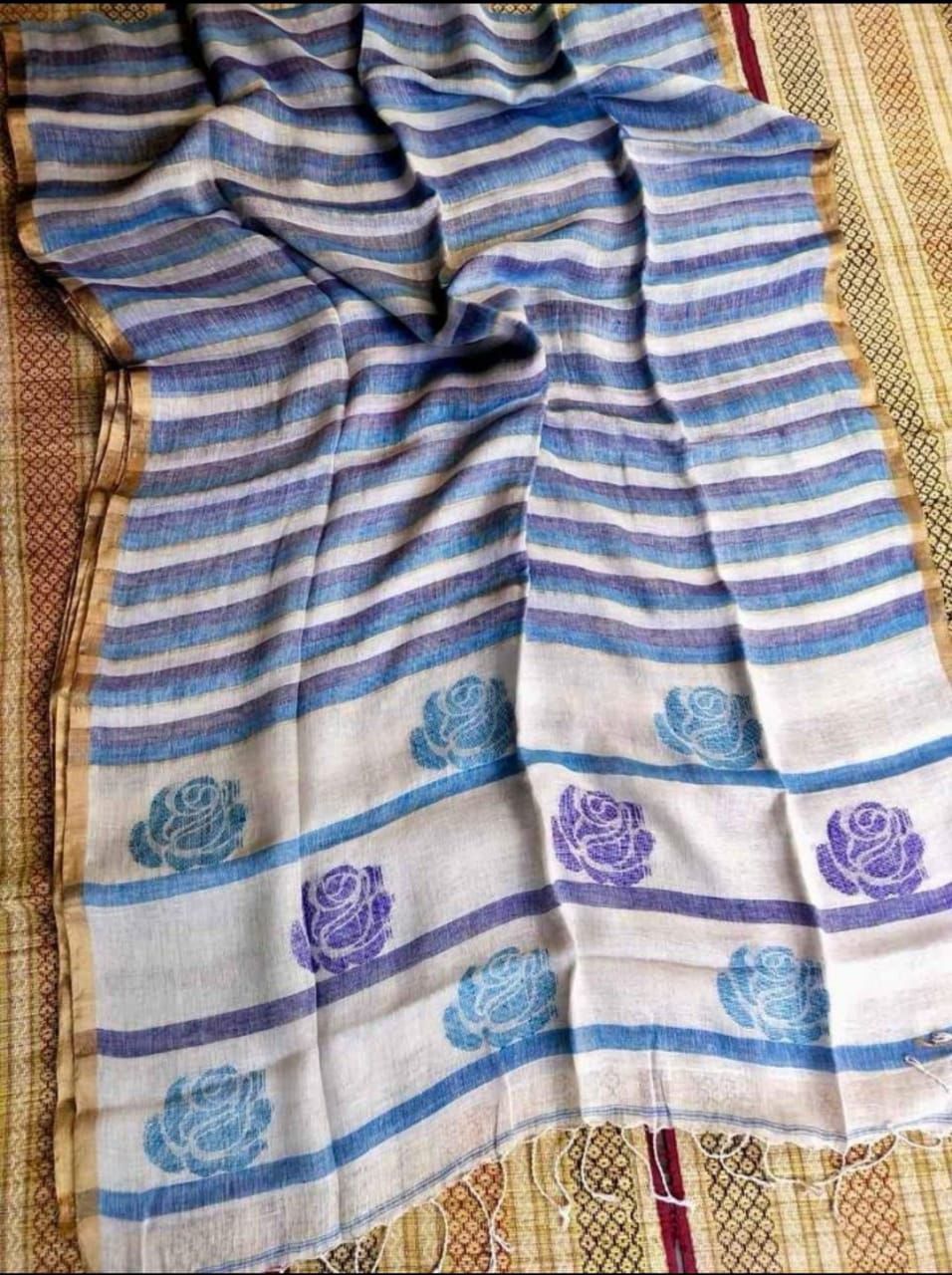 Rose handwoven striped linen saree with elegant woven stripes, rose motifs, and a lightweight traditional handloom texture by Rihyaaz 