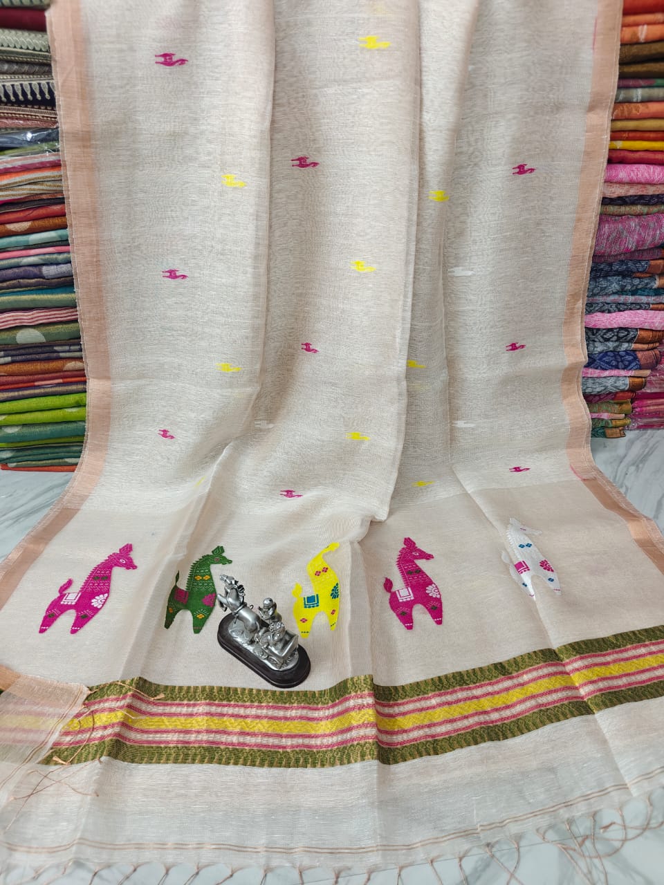 Terracotta Linen Silk Saree with intricate Resham woven palla by Rihyaaz, premium handwoven ethnic saree featuring elegant craftsmanship, soft drape, and timeless festive wear for women