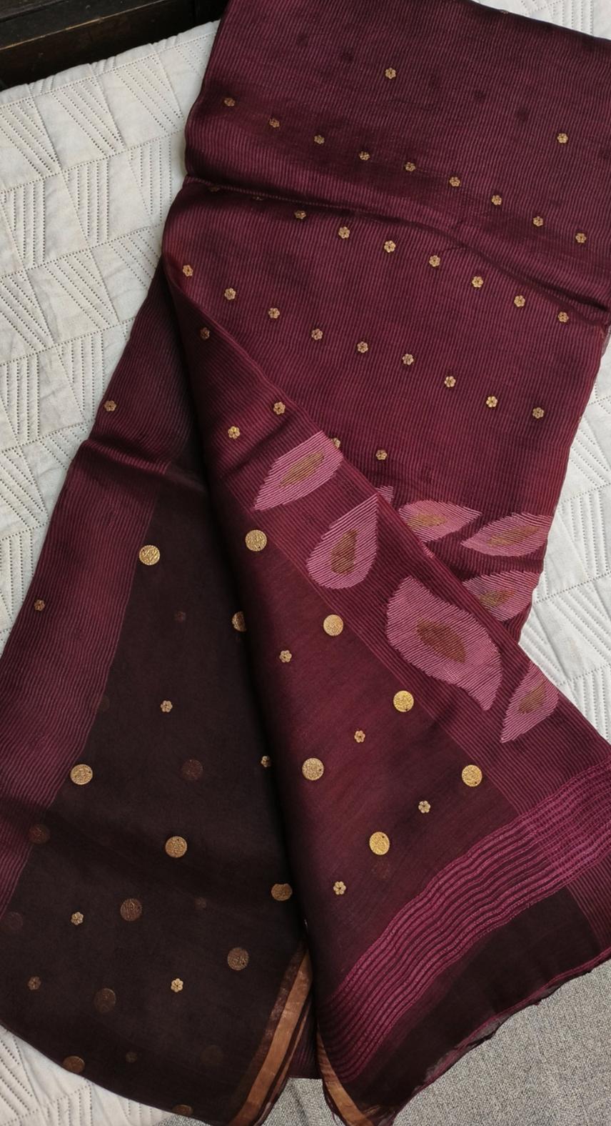 Keka premium Resham Silk Jamdani saree with handwoven needle Jamdani work, metal gini embellishments, peacock motif pallu, thin zari border, and running blouse piece.