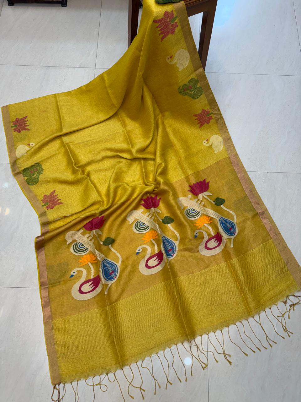 Premium handloom Resham Check Tissue Linen Paithani saree crafted in soft Silk Linen, featuring elegant check detailing and a running blouse piece by Rihyaaz.