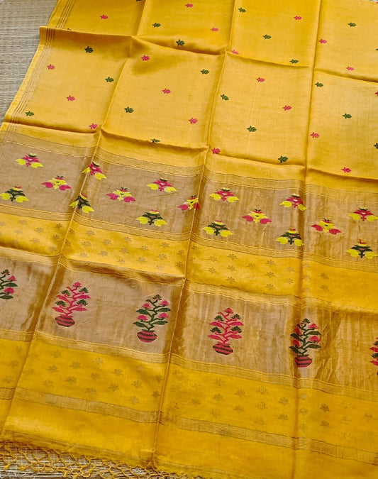 Ritwik premium Yellow tissue tussar saree with Paithani-inspired pallu and all-over Jamdani woven butta, featuring a running blouse piece from Rihyaaz’s exclusive festive collection.