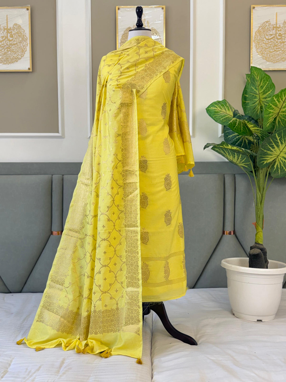 Exclusive Yellow Banarasi Chiniya Silk Unstitched Salwar Kameez Design No. 8 by Rihyaaz, featuring a semi Chiniya silk top with intricate zari weaving, matching semi Chiniya silk zari-woven dupatta, and plain dyed cotton silk bottom, 2.5 metres each, premium festive ethnic wear.
