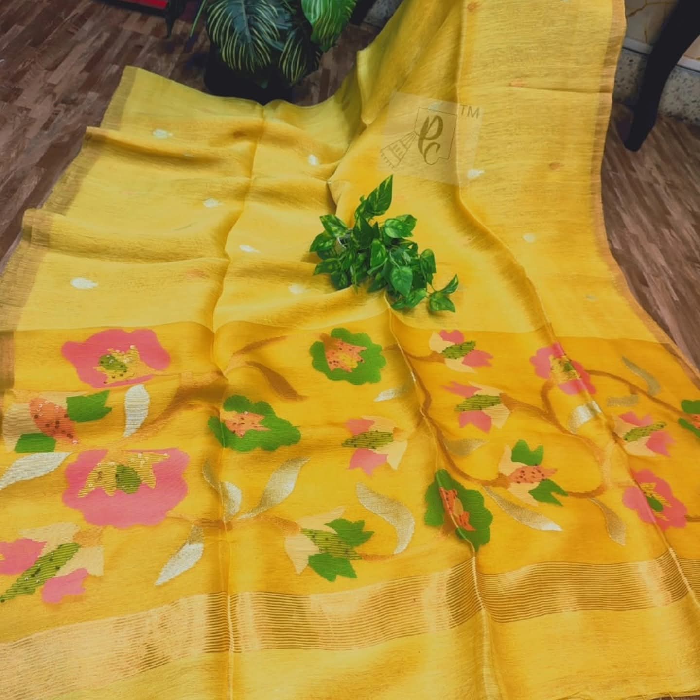 Handwoven Linen by Muslin Floral motifs saree with all-over needle weave work and golden zari border, blouse piece available | Rihyaaz