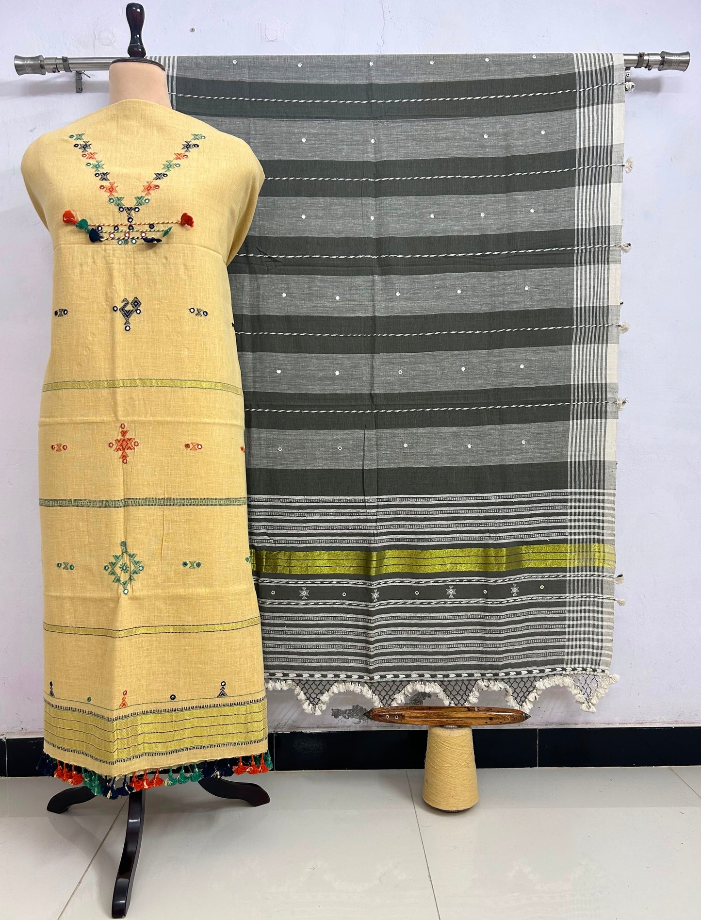 Fumka - handwoven Kapas Bhujodi 3 piece suit set with intricate mirror detailing, artisan woven kurta, matching bottoms and dupatta by Rihyaaz in sustainable handcrafted ethnic wear.