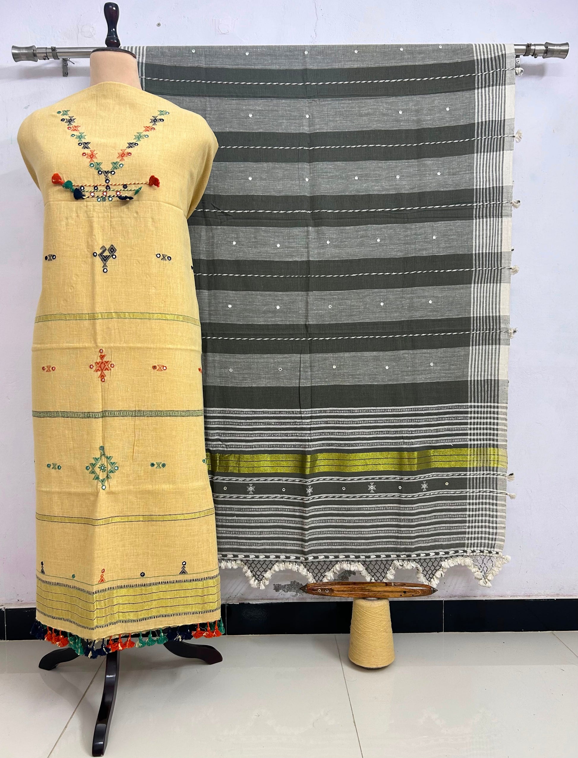 Fumka - handwoven Kapas Bhujodi 3 piece suit set with intricate mirror detailing, artisan woven kurta, matching bottoms and dupatta by Rihyaaz in sustainable handcrafted ethnic wear.