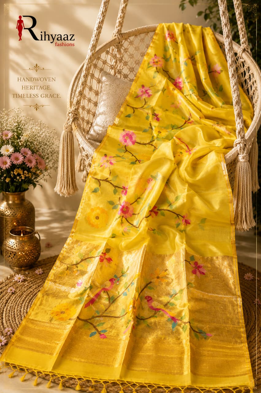 Anushua yellow Muslin Silk Paithani Palla Jamdani saree with intricate floral and bird weave by Rihyaaz.