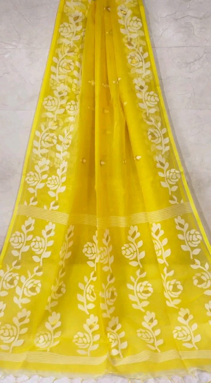 Muslin jacquard weaving saree by Rihyaaz featuring intricate woven patterns and an elegant lightweight drape.