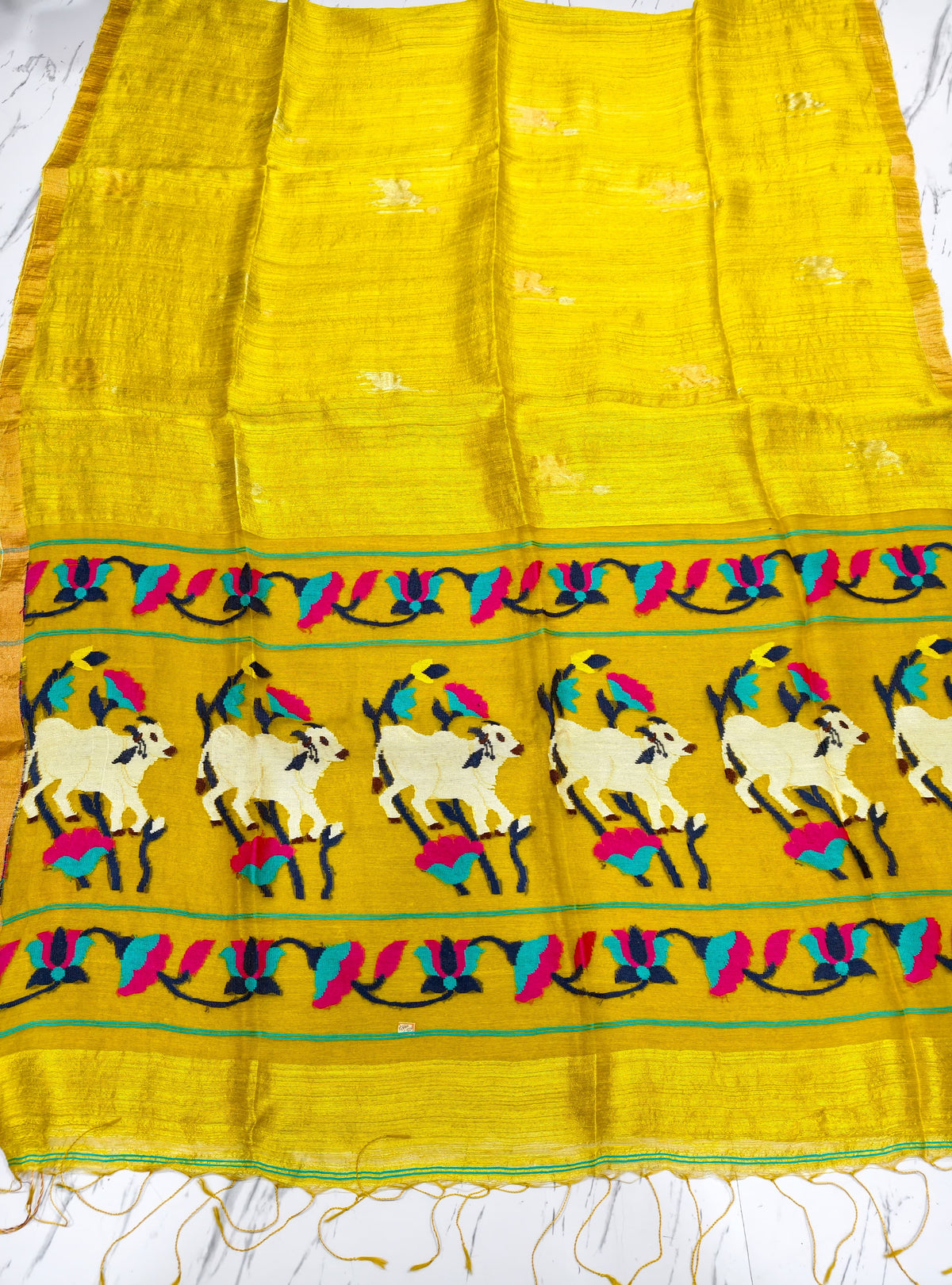 Godan yellow Pichwai Inspired Pure Motka Muslin saree with beautifully crafted pallu and matching blouse piece, Silk Mark certified by Rihyaaz Fashions.